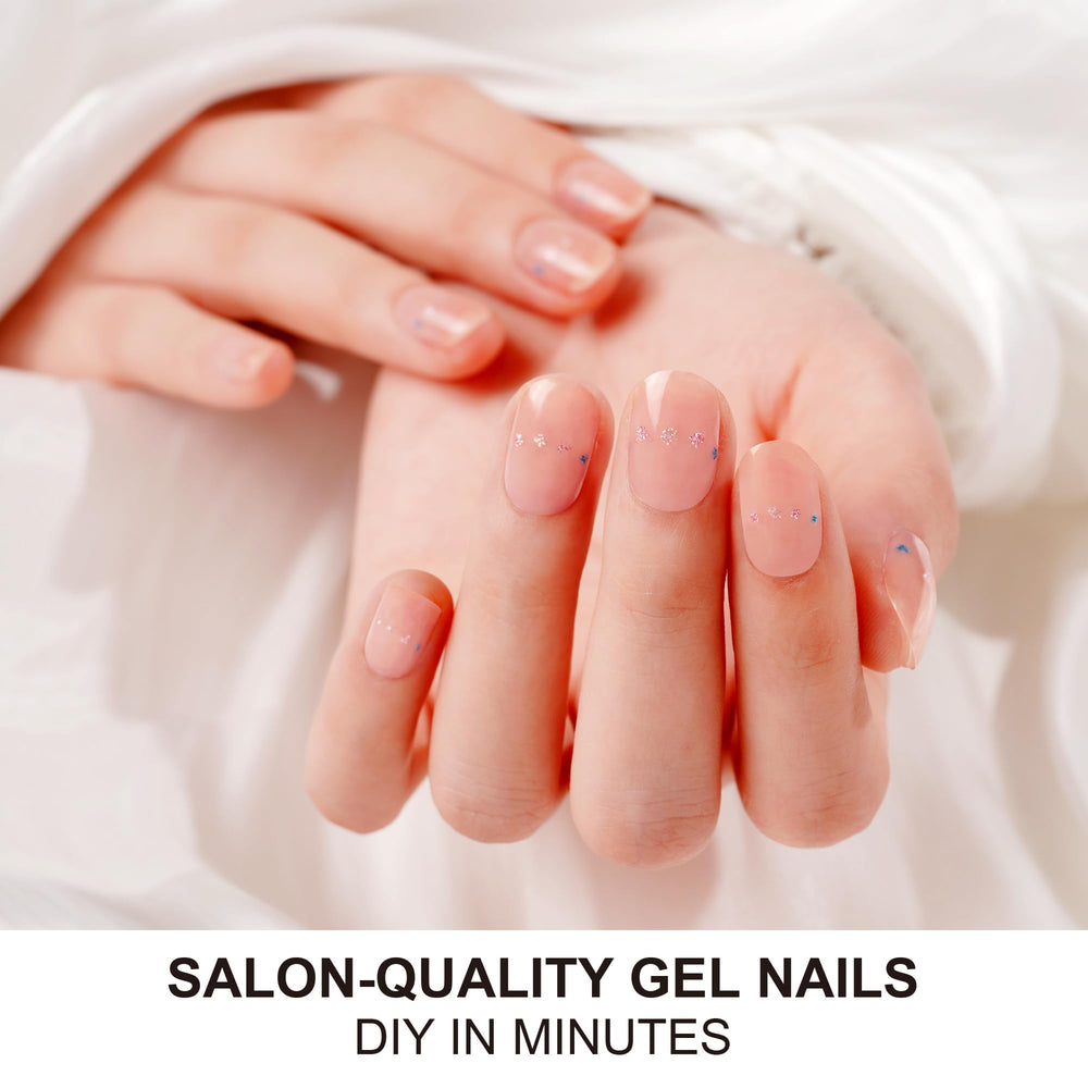 DANNI & TONI Nude Semi-Cured Nail Strips close-up of translucent glitter glaze for chic nails.