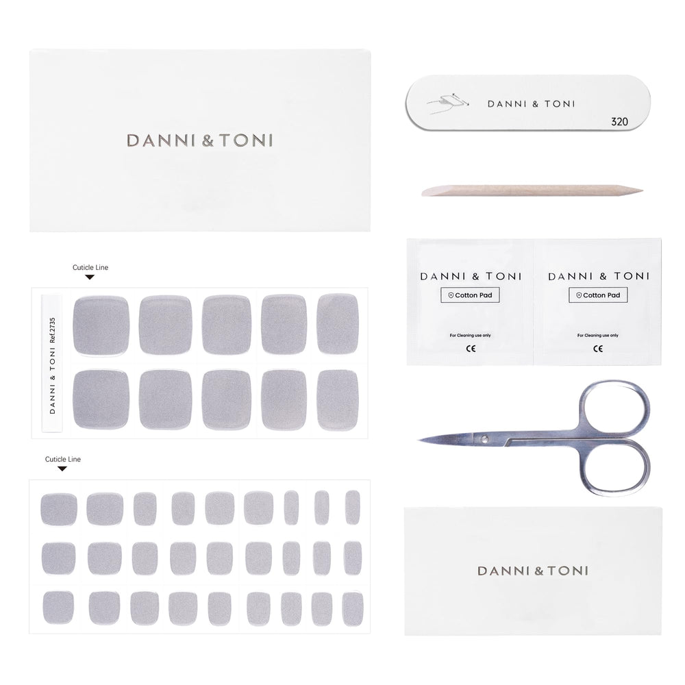 Close-up of DANNI & TONI Sliver Gloss Babe toe strips showing reflective silver finish