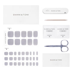 Close-up of DANNI & TONI Sliver Gloss Babe toe strips showing reflective silver finish