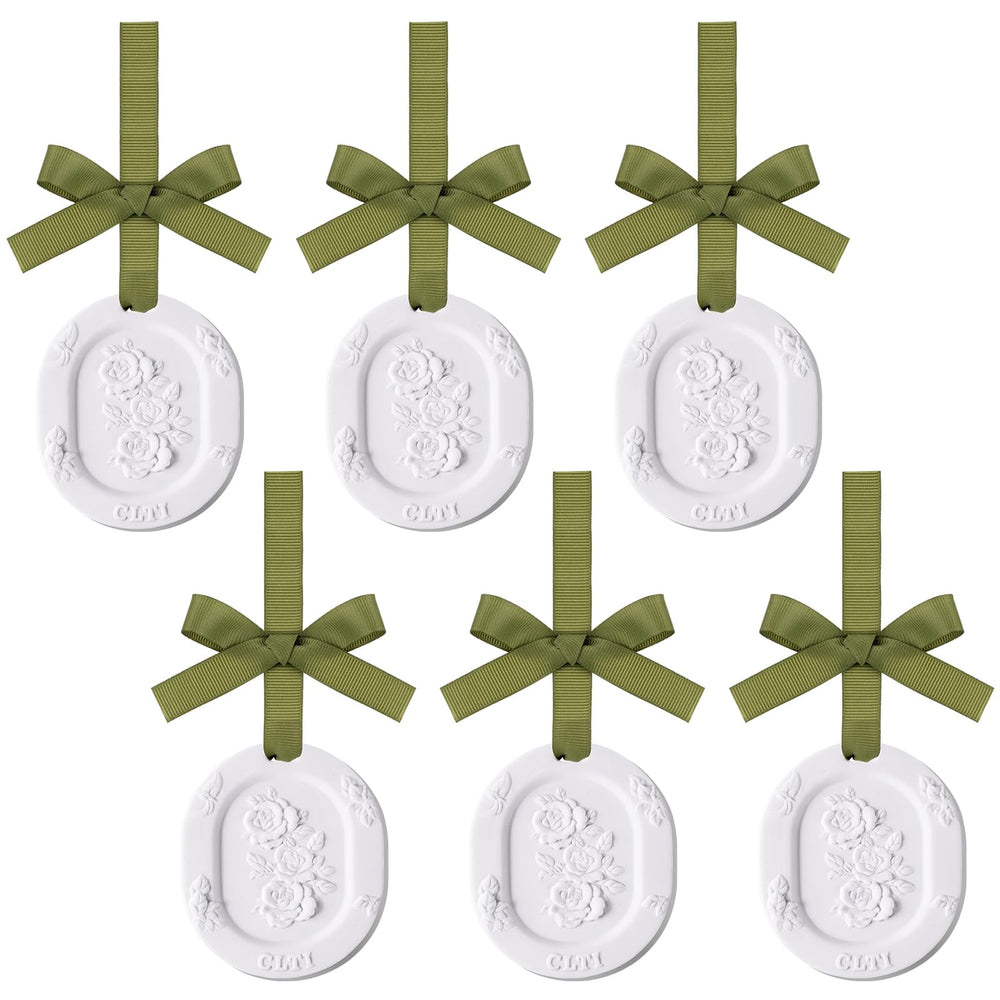 Six flower-shaped passive diffusers in a set
