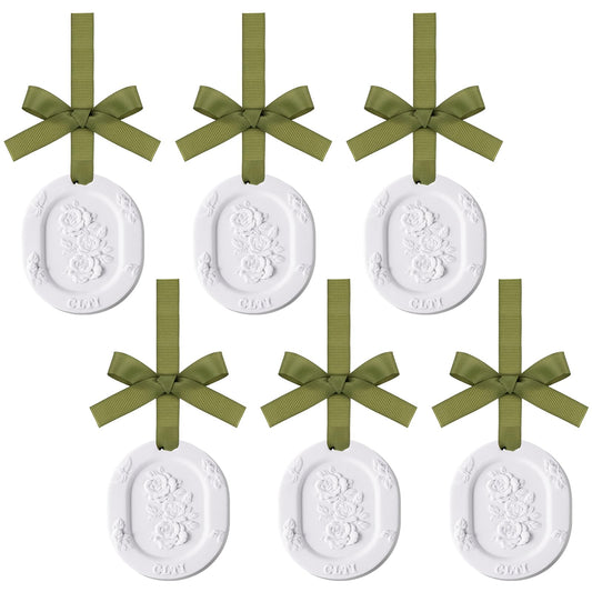 Six flower-shaped passive diffusers in a set