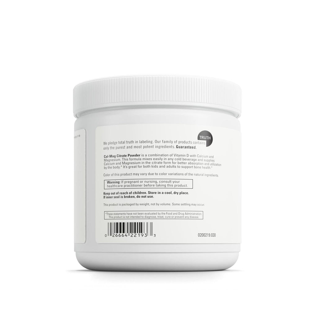 Cal-Mag Citrate Powder poured into a glass of water