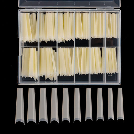 Defuber tapered extra long nail tips in a display box for easy selection
