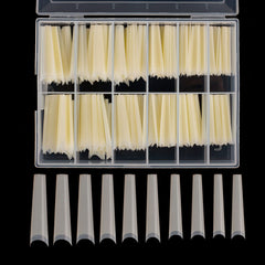 Defuber tapered extra long nail tips in a display box for easy selection