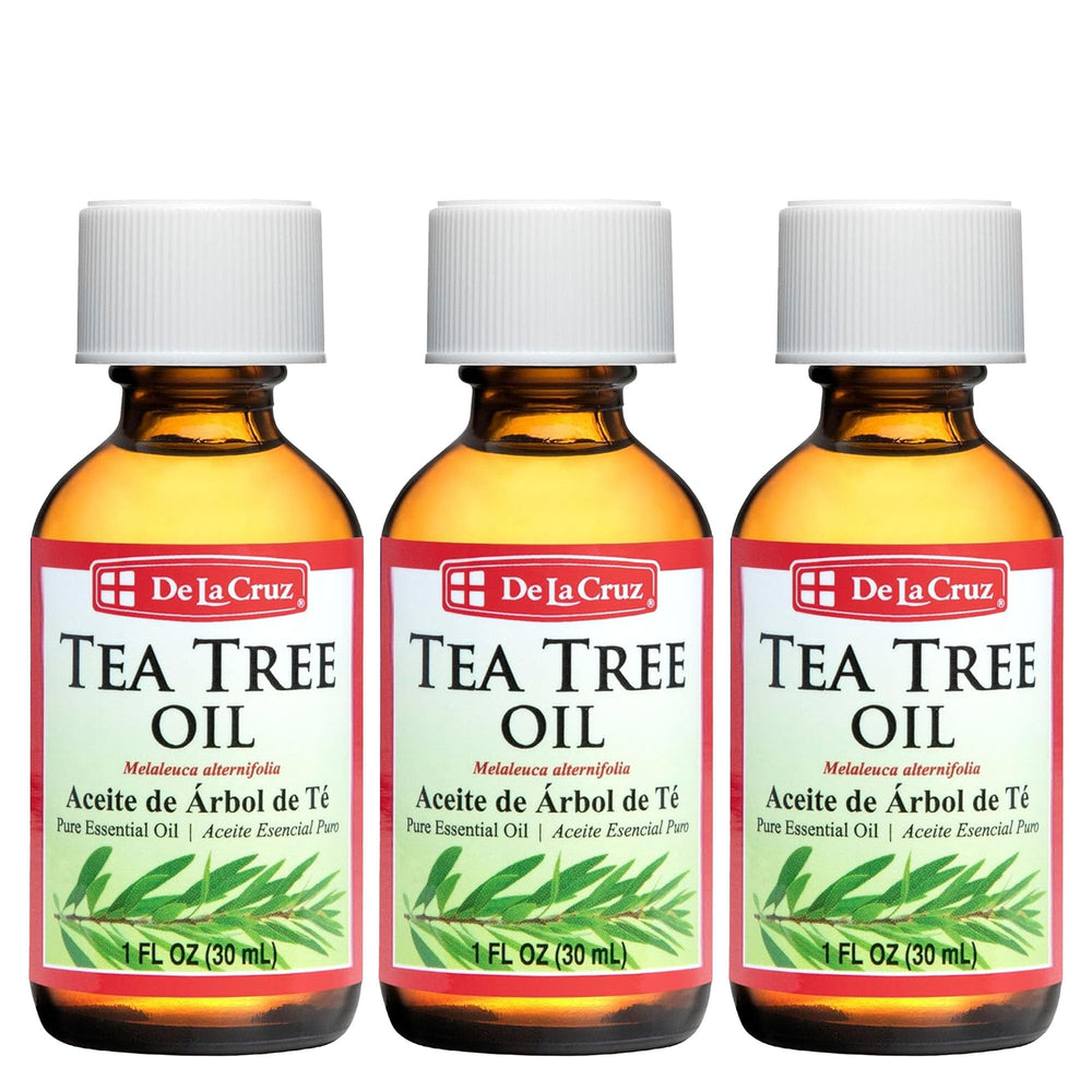 Three De La Cruz 1 oz Australian Tea Tree Oil bottles displayed together