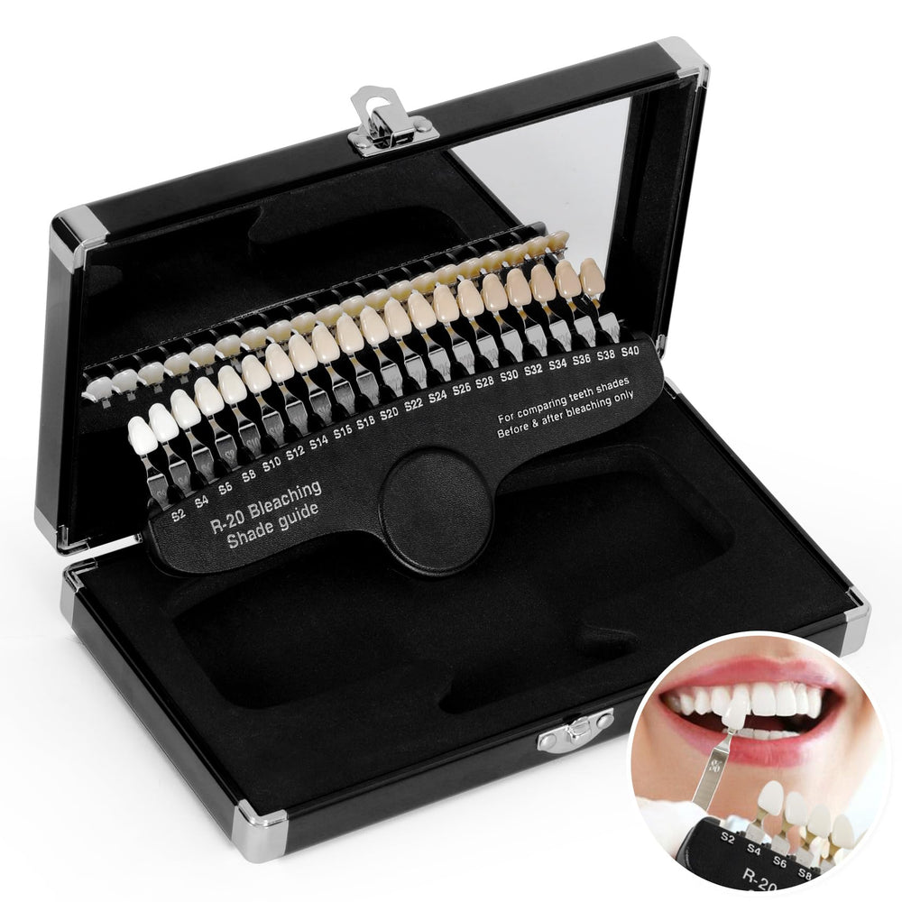 Shade guide used to track whitening progress beside teeth