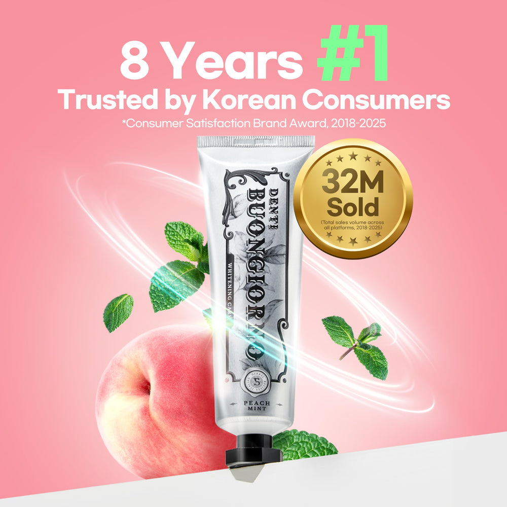Close-up of Peach Mint toothpaste being squeezed onto a toothbrush