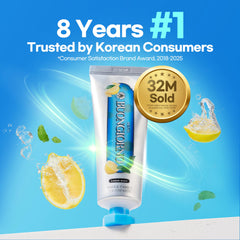 Close-up of toothpaste tube with Lemon Mint branding
