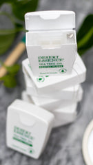 Tea tree oil antiseptic dental floss close-up