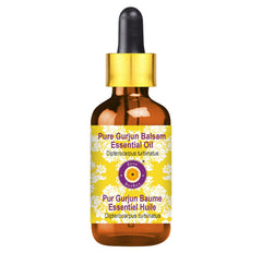 Gurjun Balsam essential oil in amber glass bottle with glass dropper