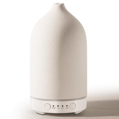 Diffuserlove ceramic essential oil diffuser with ceramic cover in living room