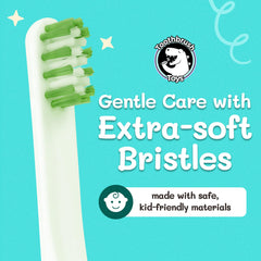Child brushing teeth with a dinosaur-themed toothbrush