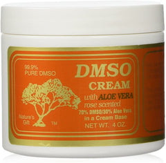 4 oz jar of DMSO cream with rose accents beside a plant.