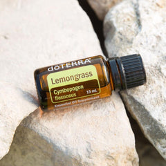 Oil being massaged into skin with lemongrass essential oil