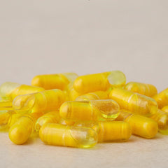 Close-up of doTERRA Turmeric Dual Chamber Capsules packaging highlighting CPTG certification