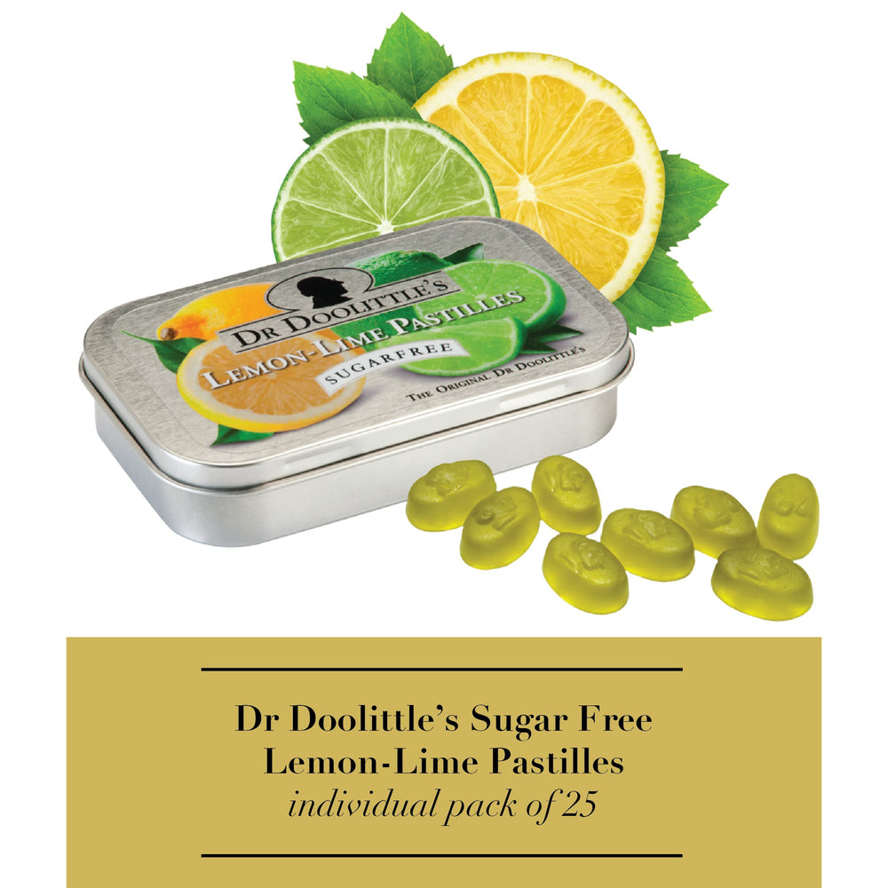Soft fruit pastilles spilling from lemon lime tin