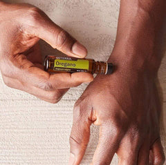 Side view of doTERRA Oregano Touch 10 mL roll-on bottle