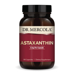 Dr. Mercola Astaxanthin bottle with organic microalgae extract for antioxidant support and daily wellness.