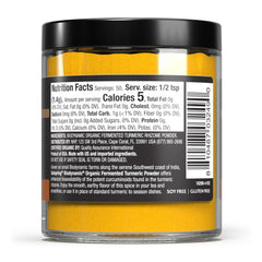 Close-up of turmeric powder in jar