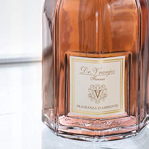 Dr. Vranjes Melograno diffuser on wooden base for elegant home décor.