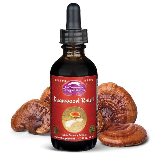 Dragon Herbs Duanwood Reishi Drops bottle on a natural surface