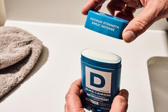 Apply-on-skin shot of Duke Cannon Trench Warfare deodorant for smooth, comfortable use.