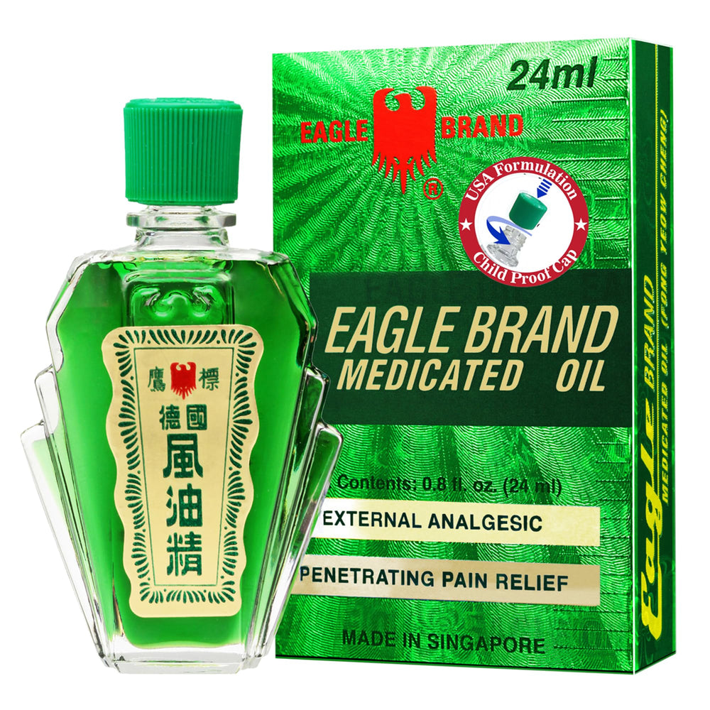 Close-up of Eagle Brand medicated oil bottles