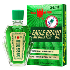 Close-up of Eagle Brand medicated oil bottles