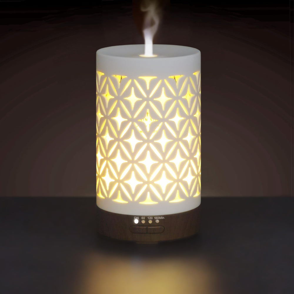 Earnest Living 100ml white ceramic essential oil diffuser – front view