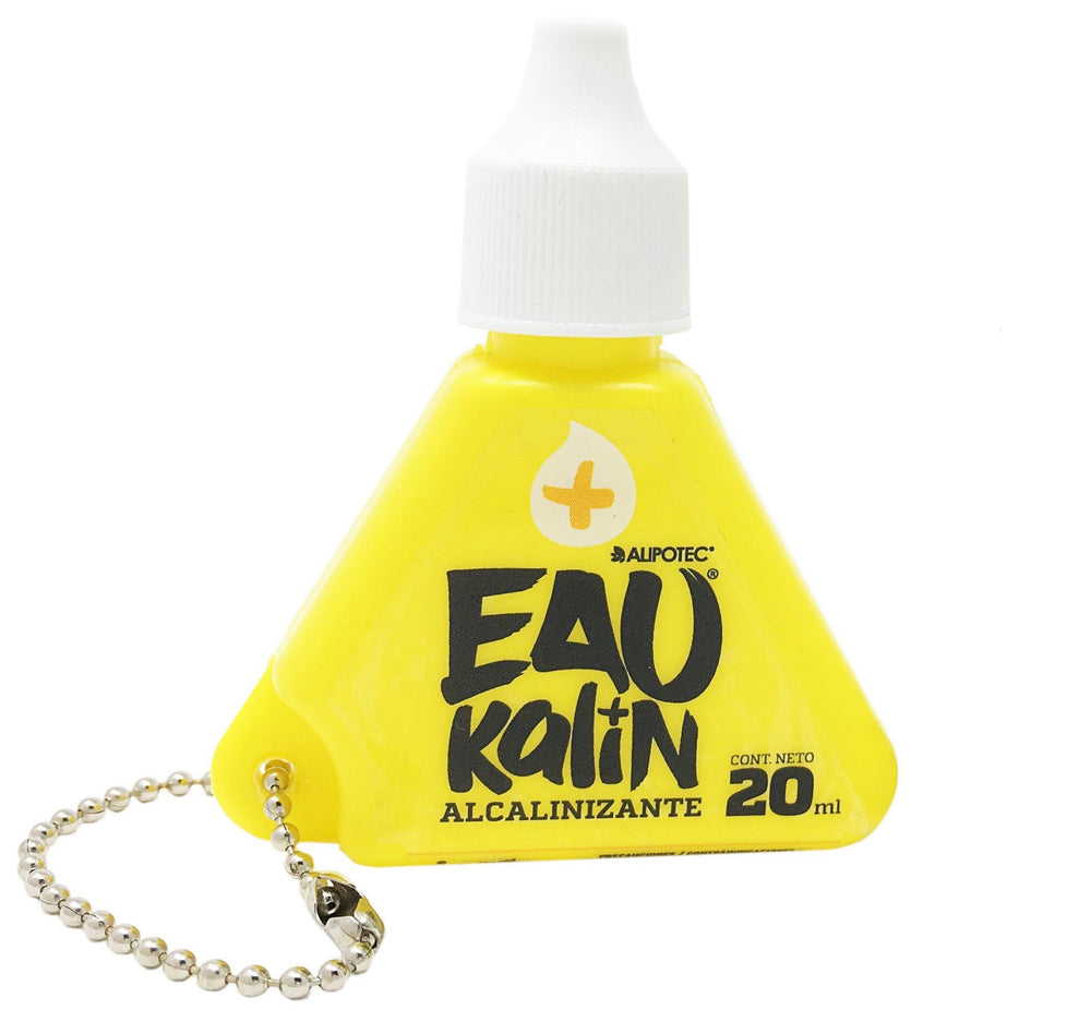 Bottle of Eau Kalin Alkaline Water Drops on white background