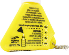 Droplets being added to a glass of water with Eau Kalin label