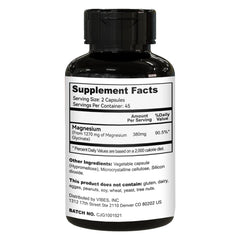 Close-up of magnesium glycinate capsules