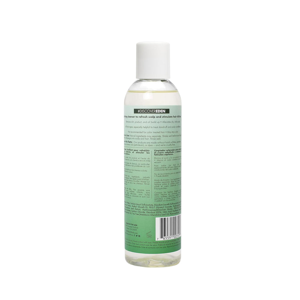 Closeup of EDEN BodyWorks Peppermint Tea Tree Shampoo label highlighting natural ingredients.
