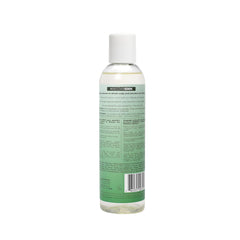 Closeup of EDEN BodyWorks Peppermint Tea Tree Shampoo label highlighting natural ingredients.