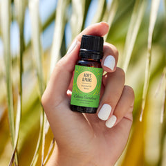 Close-up of essential oil bottle with dropper