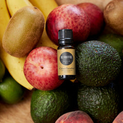 Close-up of Tangerine and Orange essential oils used in Be Fruitful blend