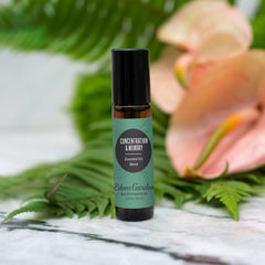 Roll-on applicator close-up with essential oil