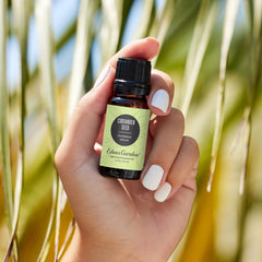 Side view of coriander seed essential oil bottle