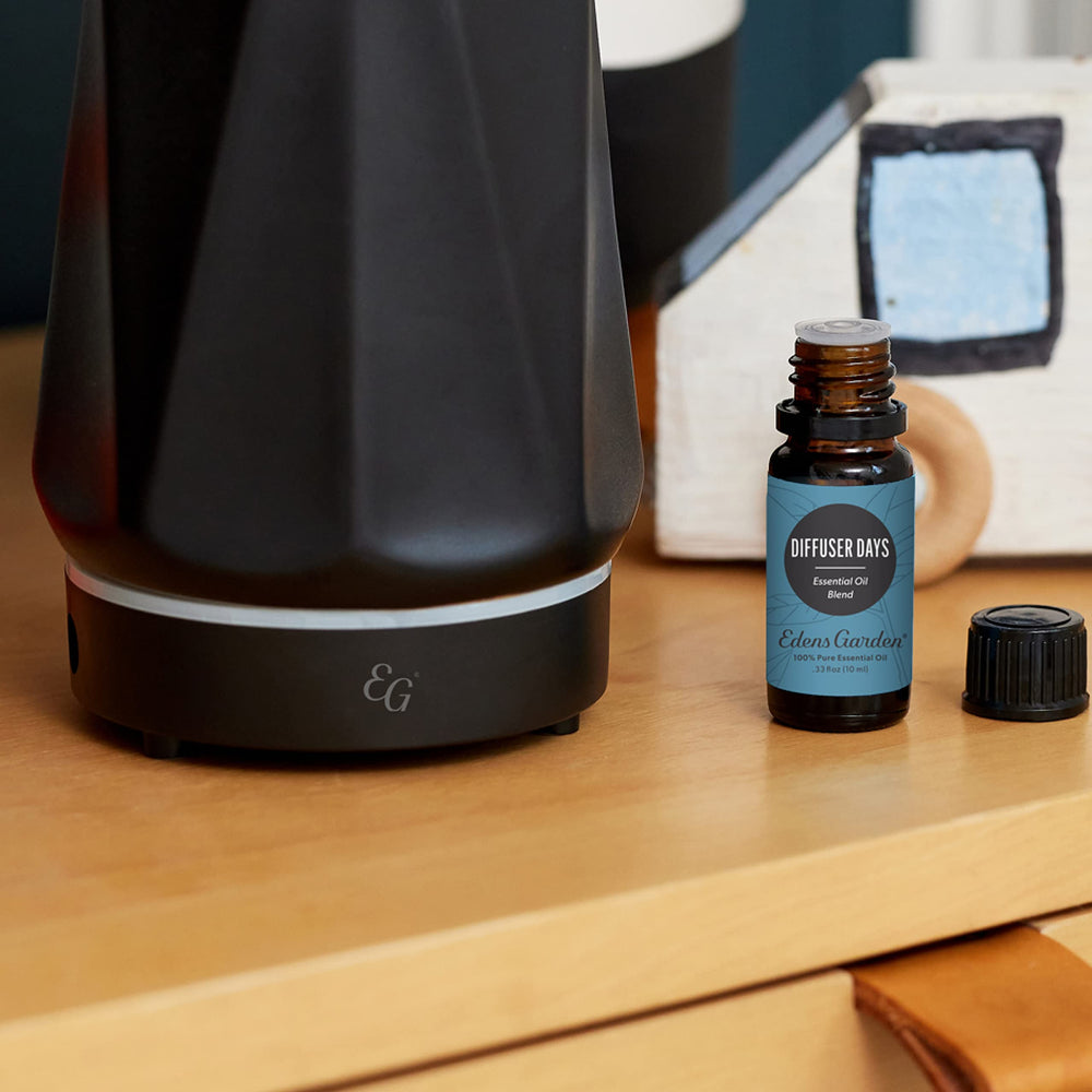 Close-up of Diffuser Days essential oil blend bottle