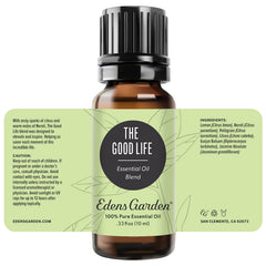 10 ml bottle of The Good Life essential oil blend resting on natural surface