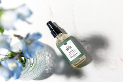 Massage application of muscle relief oil on shoulder
