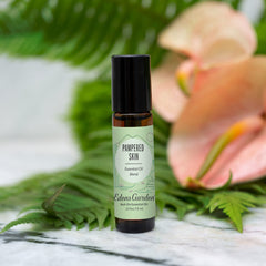 Close-up of the roll-on label highlighting 100% pure essential oils