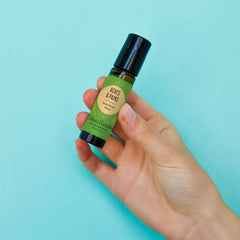Close-up of Edens Garden roll-on bottle
