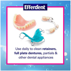 Denture soaking in cup with water using Efferdent Cleanser