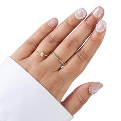 ELEVATED LÉGACY press-on nails short almond demonstrate quick, flawless manicure.