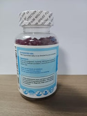 Blueberry flavored gummies spilling from bottle