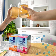Pouring Ener-D powder into water for hydration