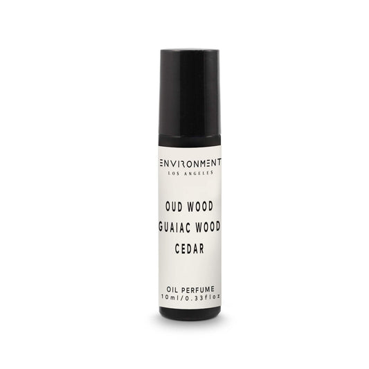 ENVIRONMENT TF Oud Wood roll-on bottle for on-the-go fragrance touch-ups.