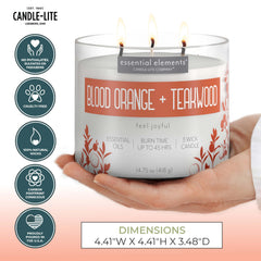 Essential Elements Blood Orange Teakwood candle glow creates a warm, cozy ambiance