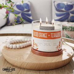 Essential Elements Blood Orange Teakwood candle wicks close-up showing three cotton wicks for even burn